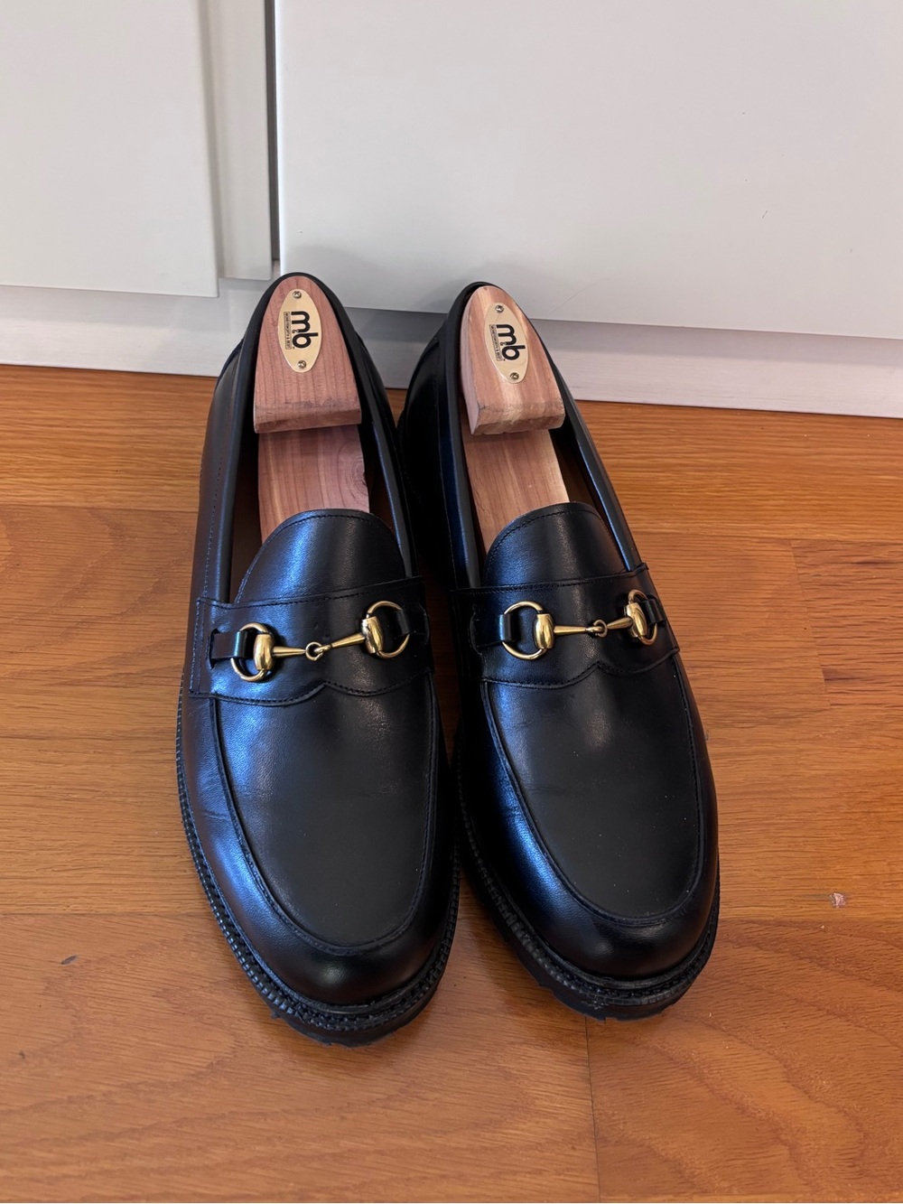 Black Leather Lug-Sole Penny Loafers with Gold Bit